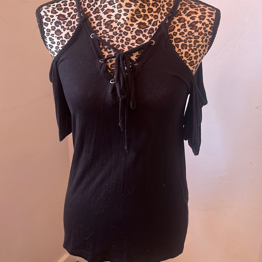 Black causal cute Tee with off shoulder and straps. Only work once.